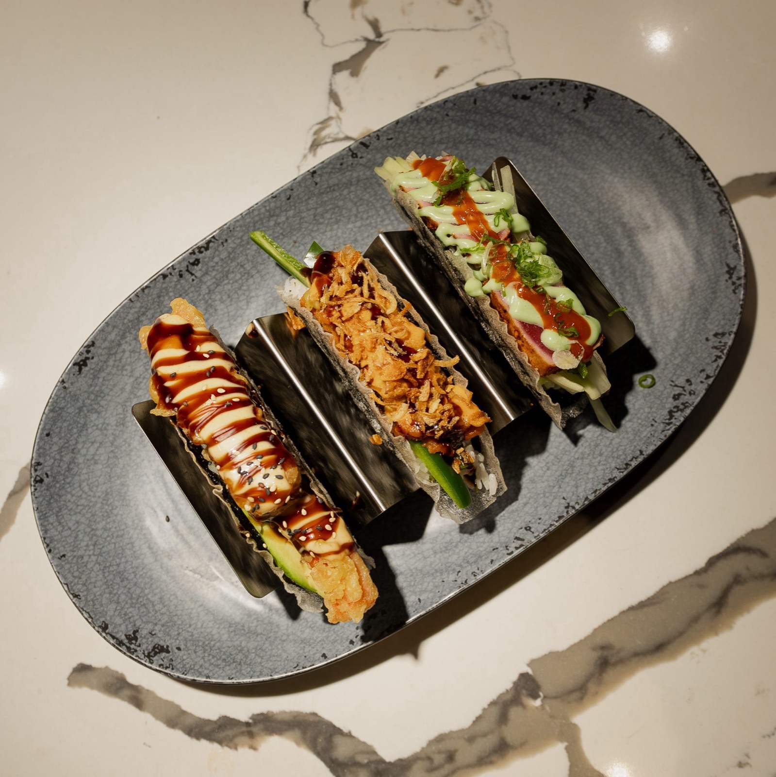Trio of signature sushi tacos