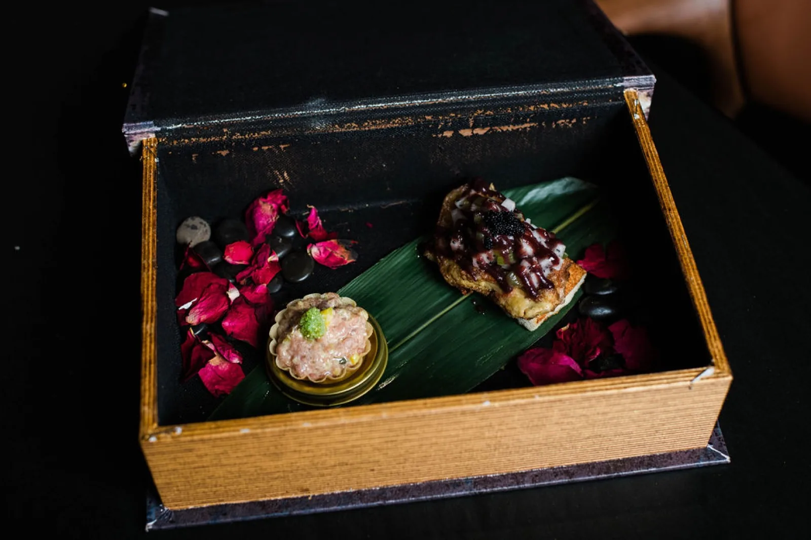 The flaming presentation box at Okane Omakase