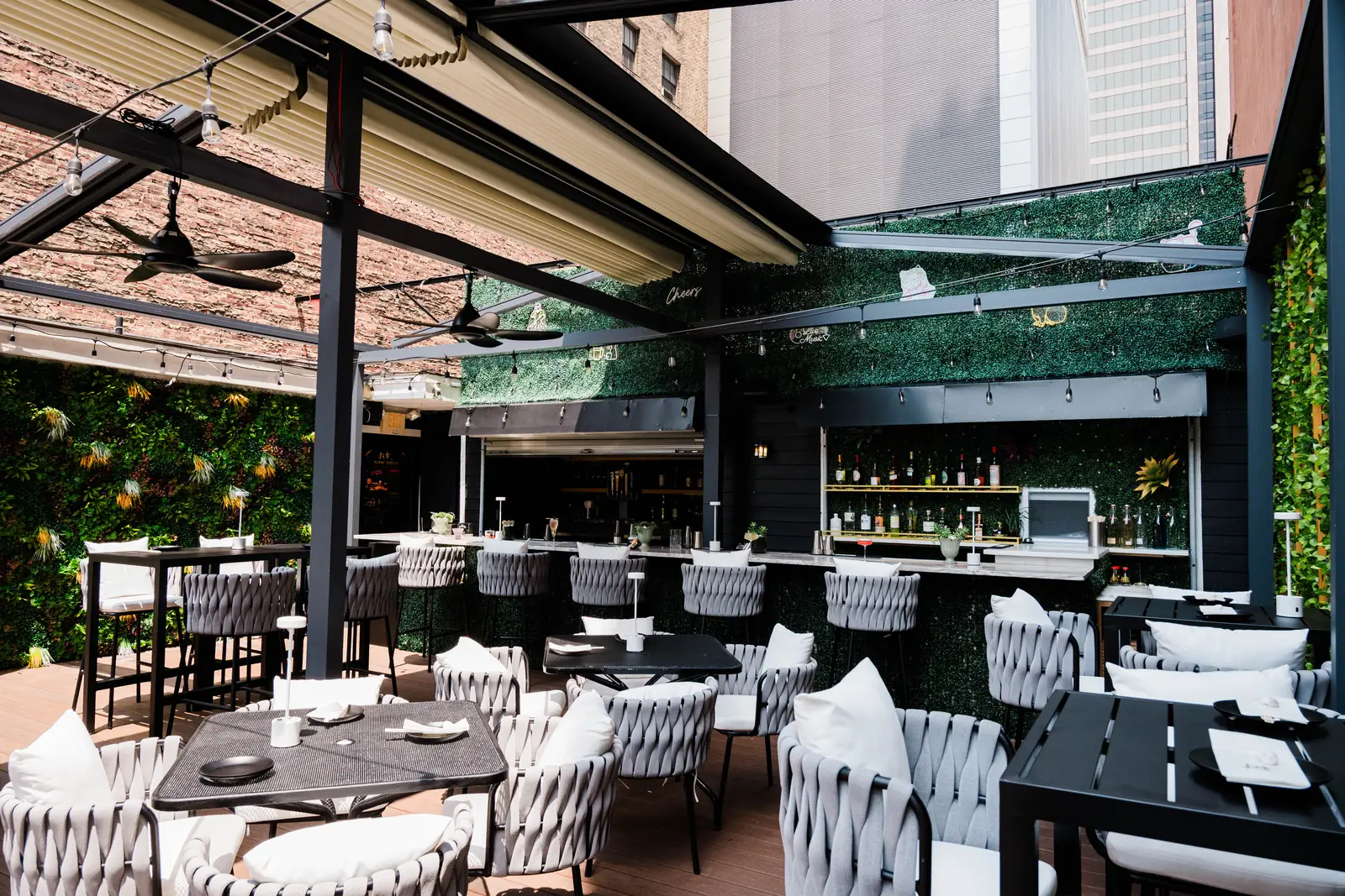 Patio seating facing the Okane Rooftop bar